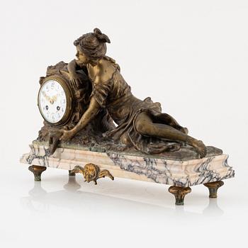 A mantle clock, after Francois and Louis Moreau, France, around 1900.