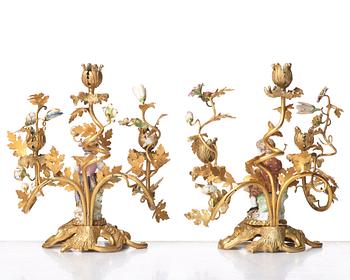 A pair of Meissen Rococo-style three-light candelabra, second half of the 1800's.