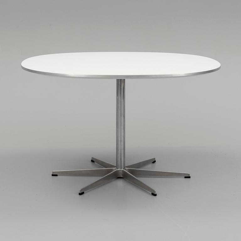 A 1990 'Supercirkulär' table by Bruno Mathsson & Piet Hein, Fritz Hansen, Denmark.