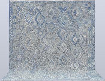 A Kilim carpet, approx. 375 x 311 cm.
