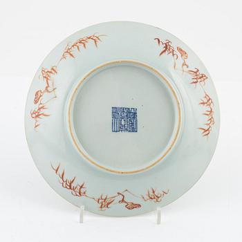 A Chinese celadon dish, late Qing dynasty/circa 1900.