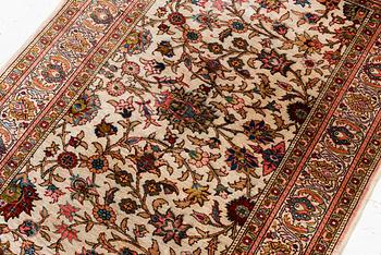 An Oriental silk rug, c. 122 x 76 cm.