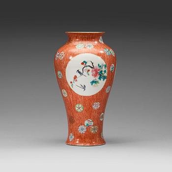 A famille rose vase , Qing dynasty, 19th century with Qianlong sealmark in red.