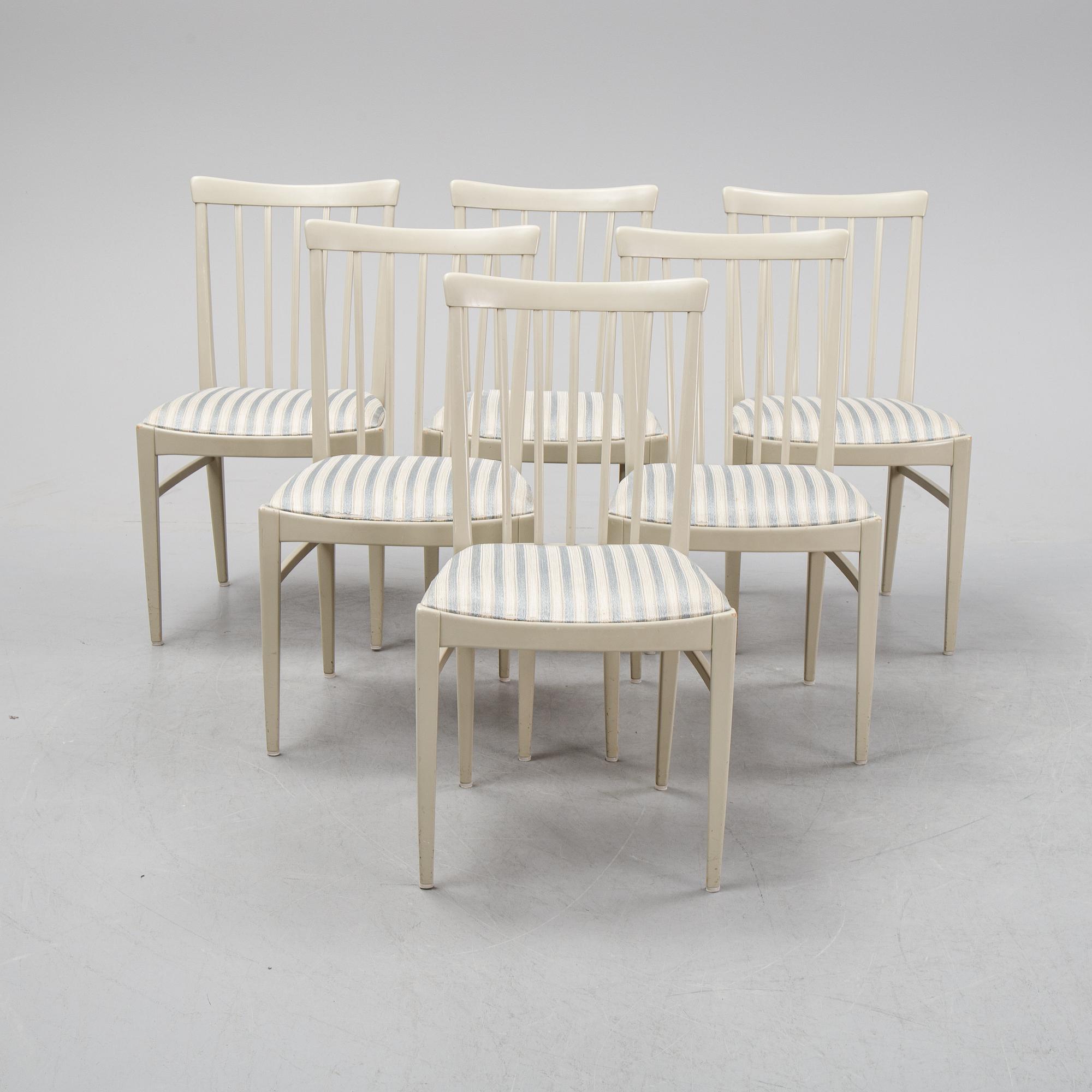 A dining table and six chairs by Carl Malmsten for Bodafors.