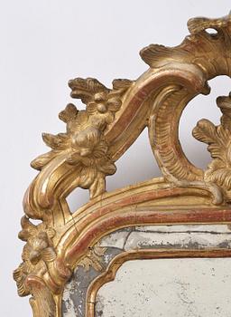 A Swedish Rococo mirror, 18 th century.