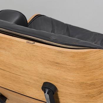A armchair and footstool, "Lounge Chair", Charles & Ray Eames, USA, Herman Miller, 1970s,