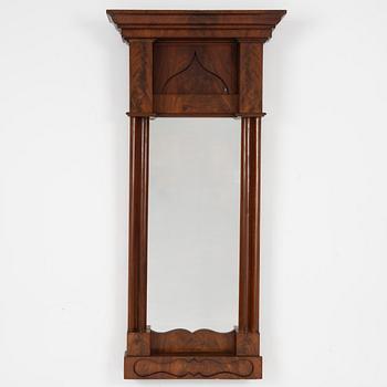 An Empire mirror, first half of the 20th Century.