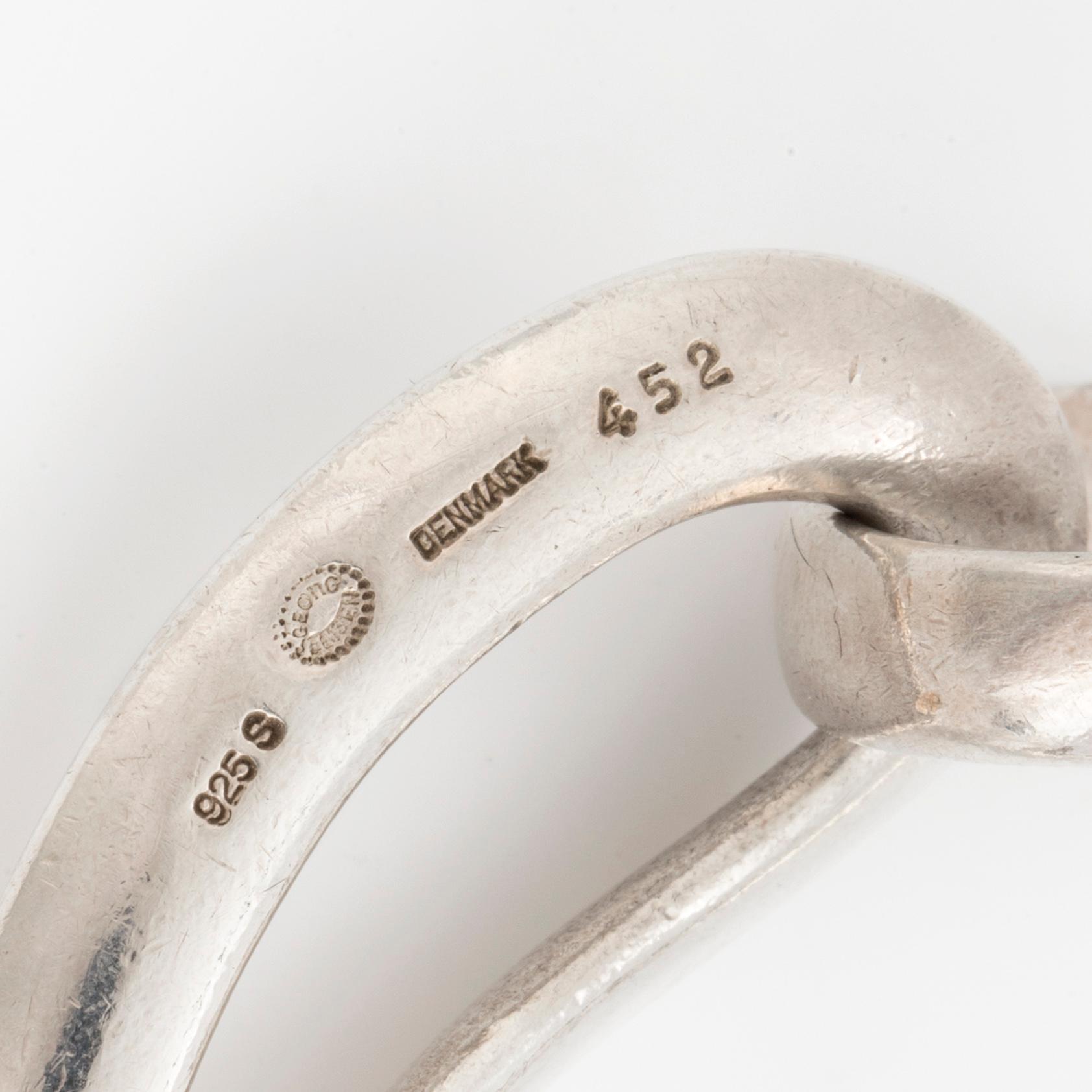 An 'Infinity' silver bracelet by Georg Jensen.