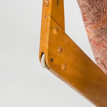 Ilmari Tapiovaara, an early 1960s 'Dolphin chair' for Skanno.