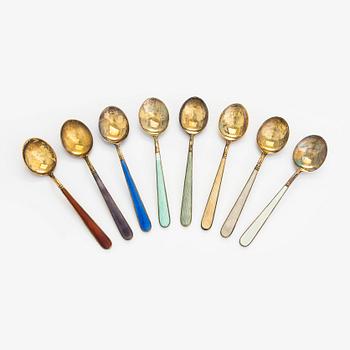 Tillander, an 8-piece set of enamelled and gilt sterling silver coffee spoons, Helsinki 1953. In original box.