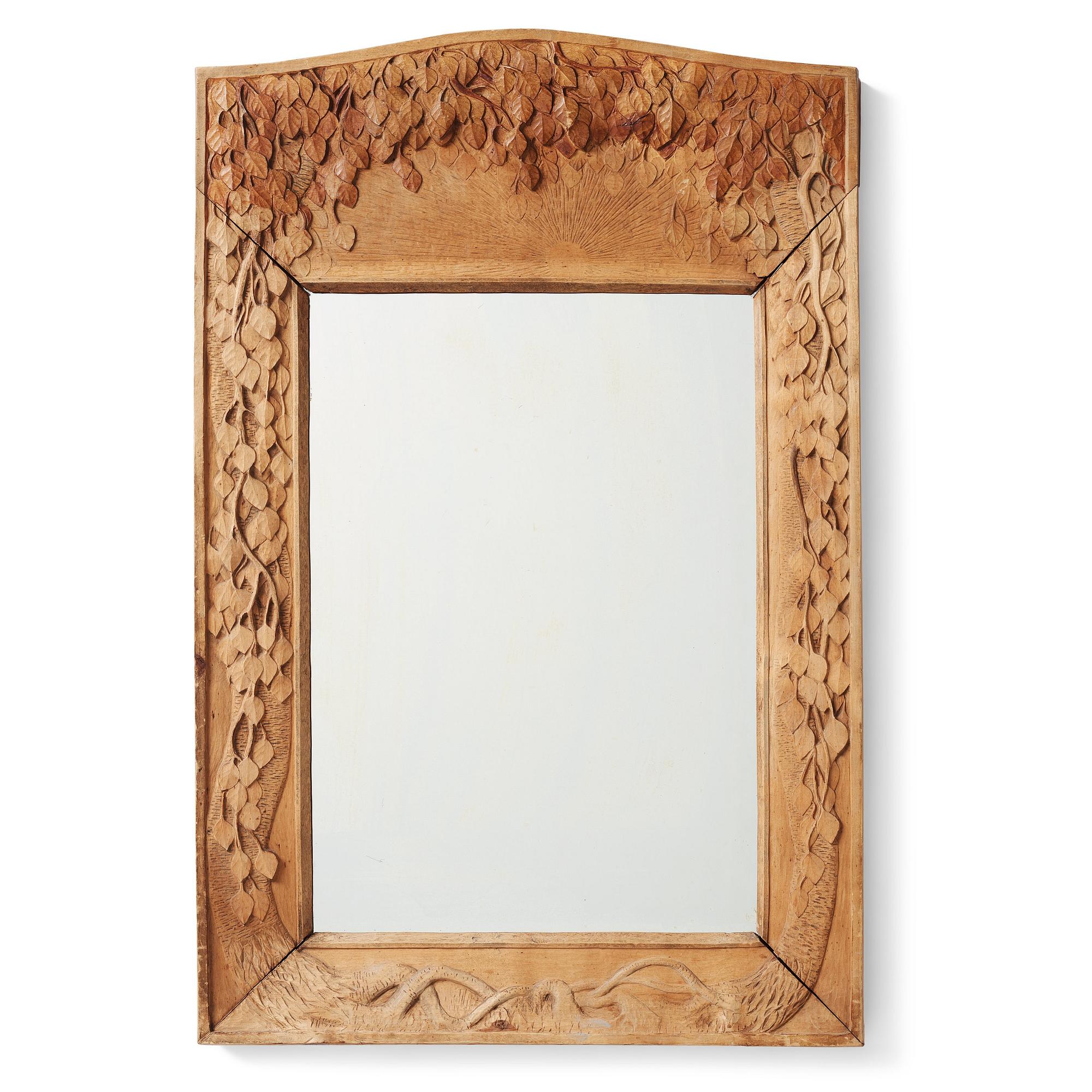 A Swedish Art Nouveau/ Folk art carved mirror, early 20th century.