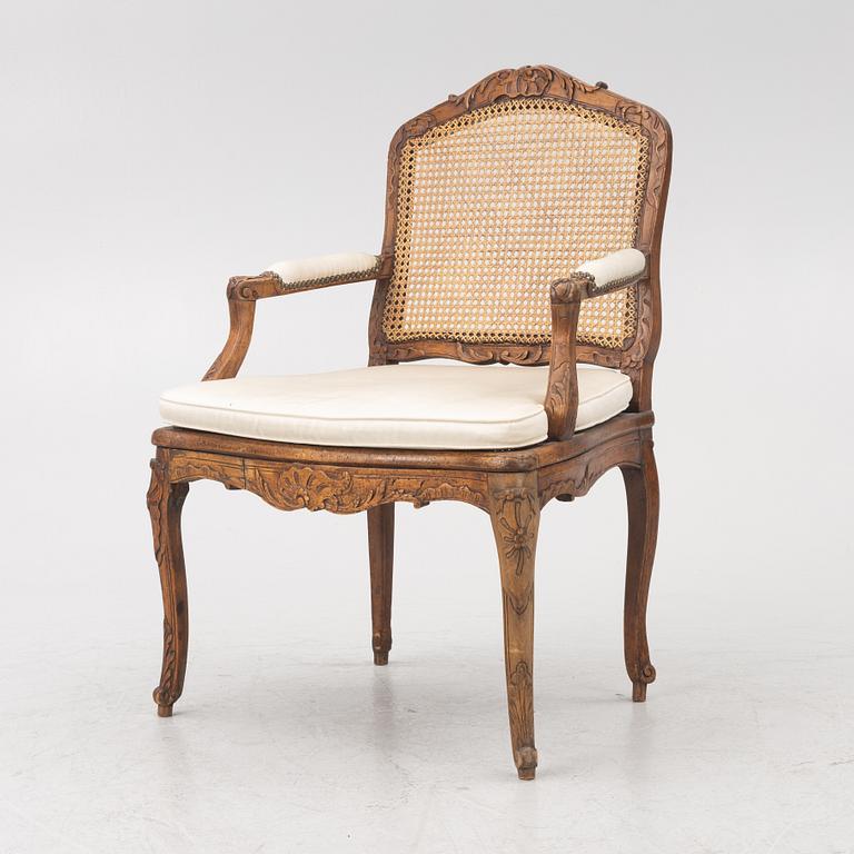 A French Louis XV armchair, mid 18th century.