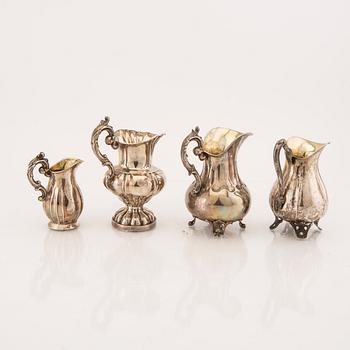 A set of four Swedish 19th century silver creamer.