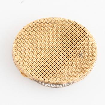 An 18K gold box set with eight-cut diamonds.