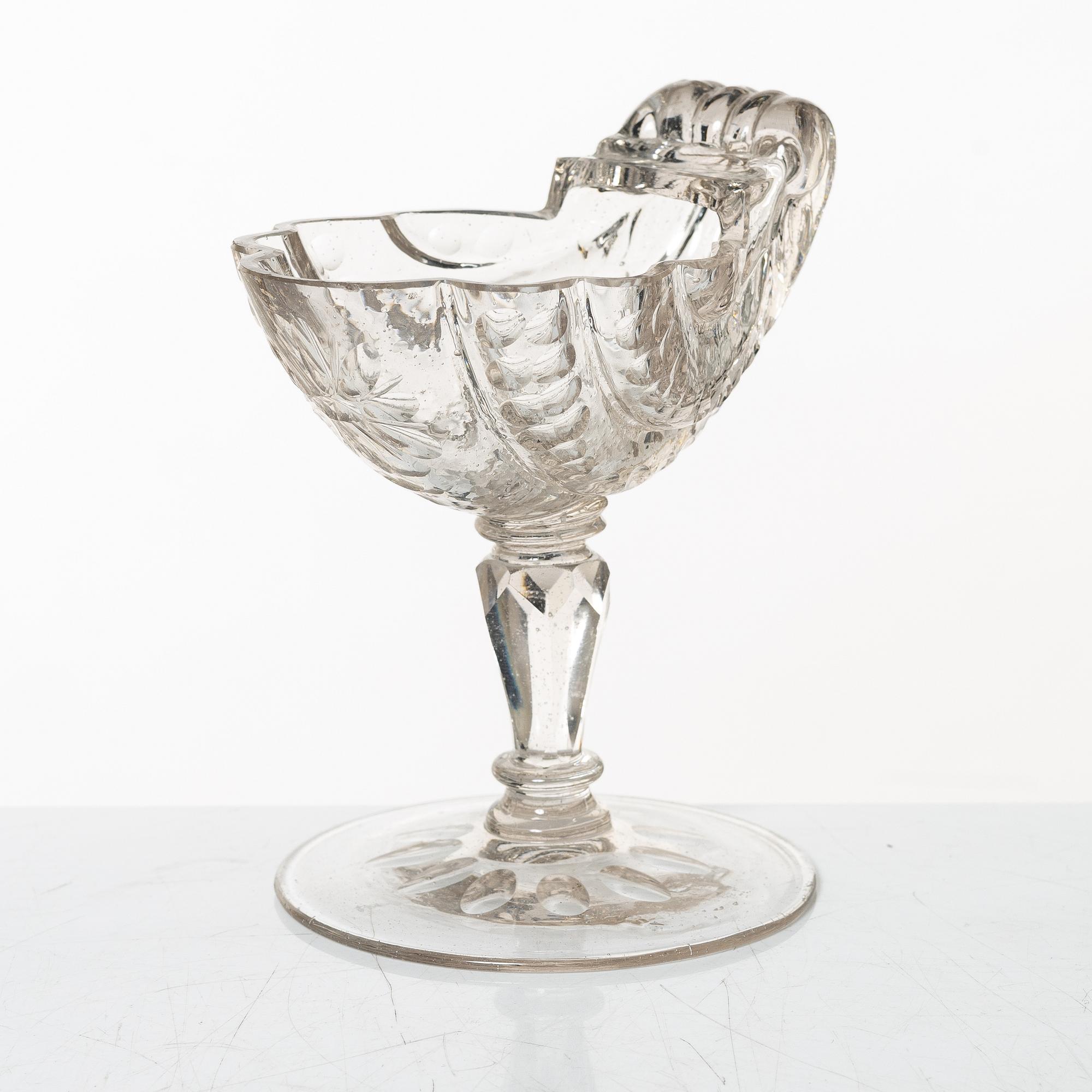 A cut glass, shell formed, bowl on facetted stem, Silesia, 18th Century.
