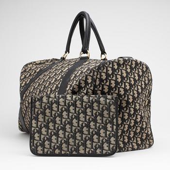 CHRISTIAN DIOR, a black monogram canvas bag and clutch bag.