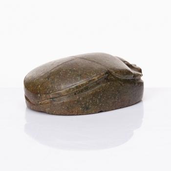 An Egyptian hardstone funerary scarab, probably Late Period, 26th-30th Dynasties, circa 664-343 B.C.