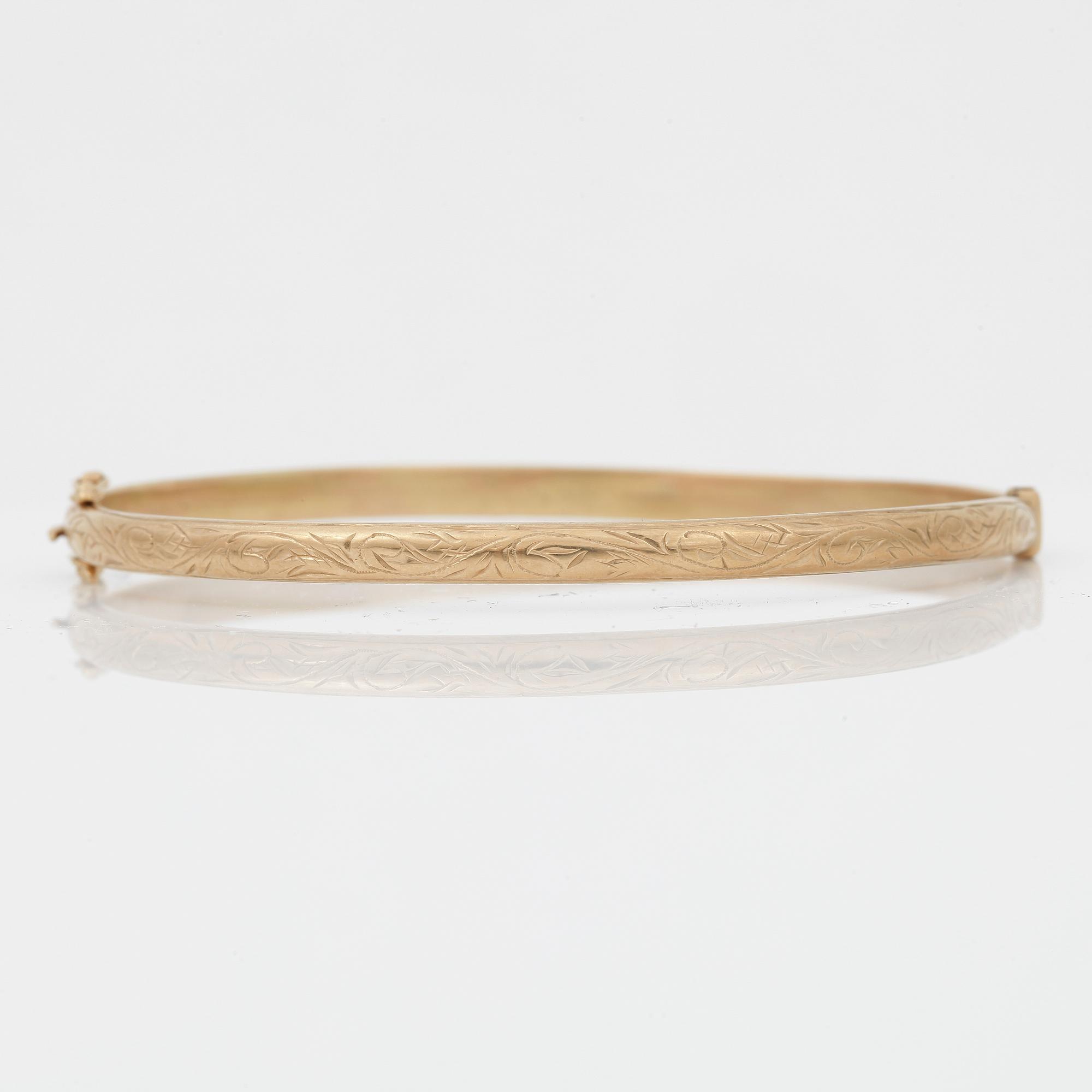 ARMRING, guld 18k, Stockholm 1900-tal. Vikt ca 6 gram.