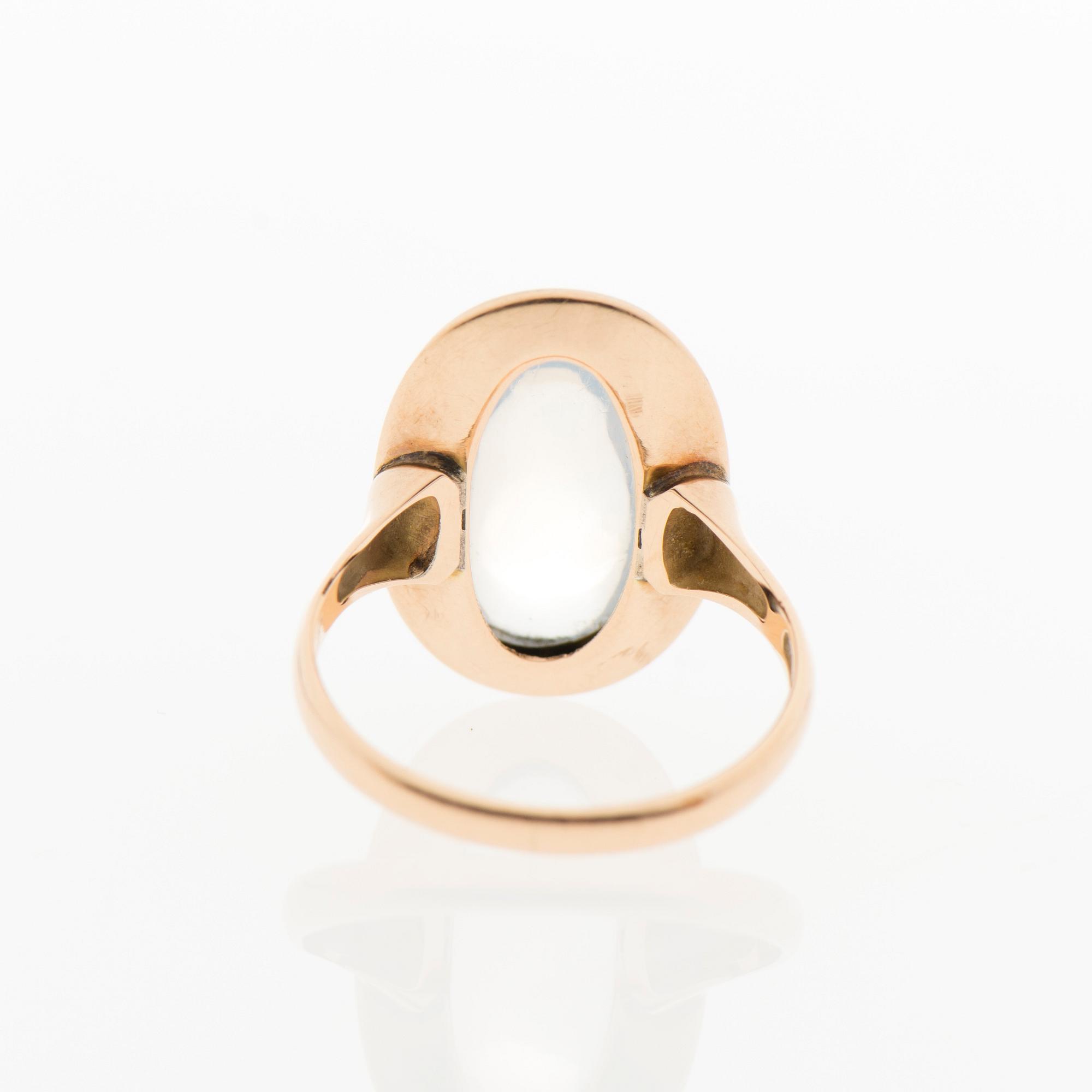 SORMUS, pyöröhiottu kuukivi, kultaa. Korutuote, Heinola Finland 1958.