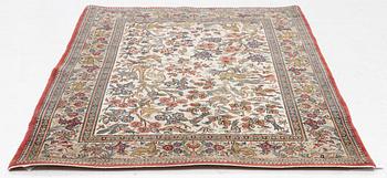 A figural Ghom, rug, c. 160 x 107 cm.