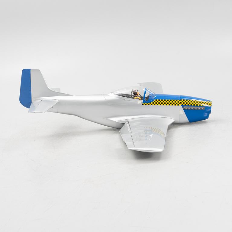 An unassembled balsa wood av plastic scale model of a P-51 Mustang from Black horse model.