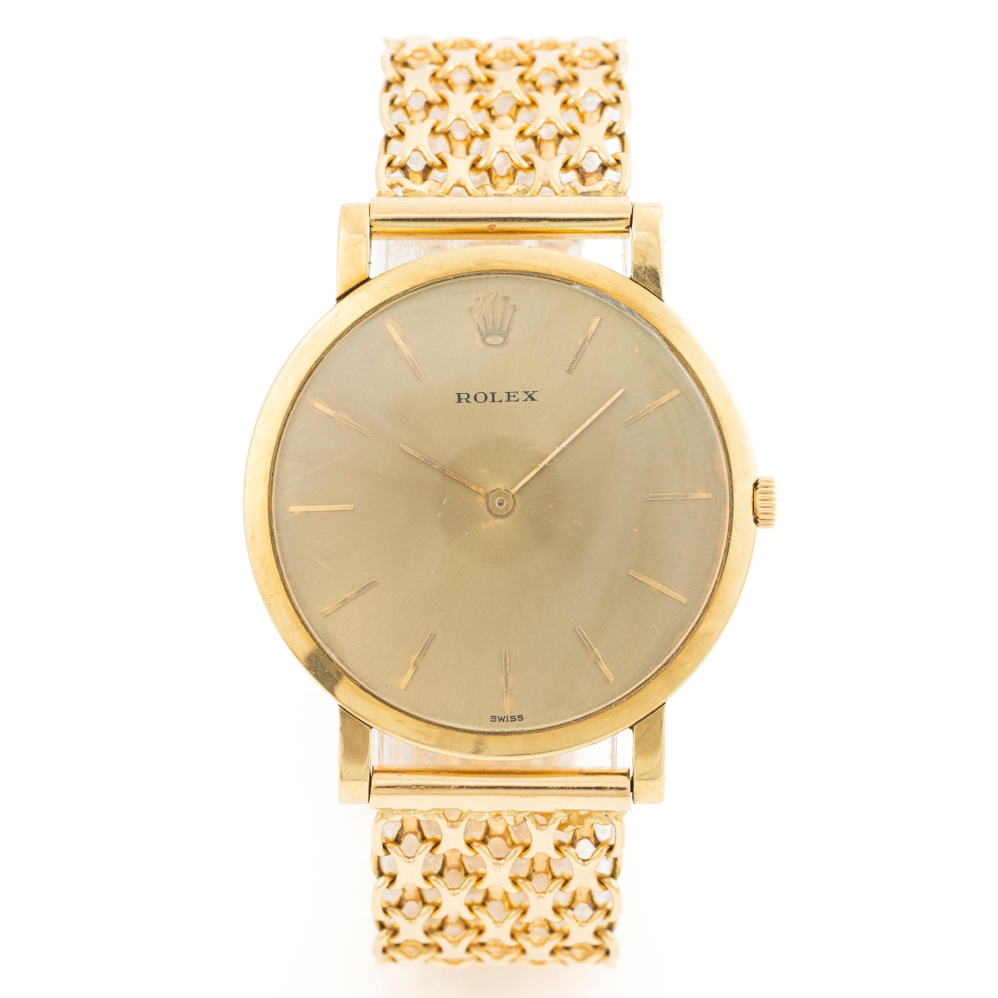Rolex, 18K gold, with an 18K gold bracelet, wristwatch, 31.5 mm.