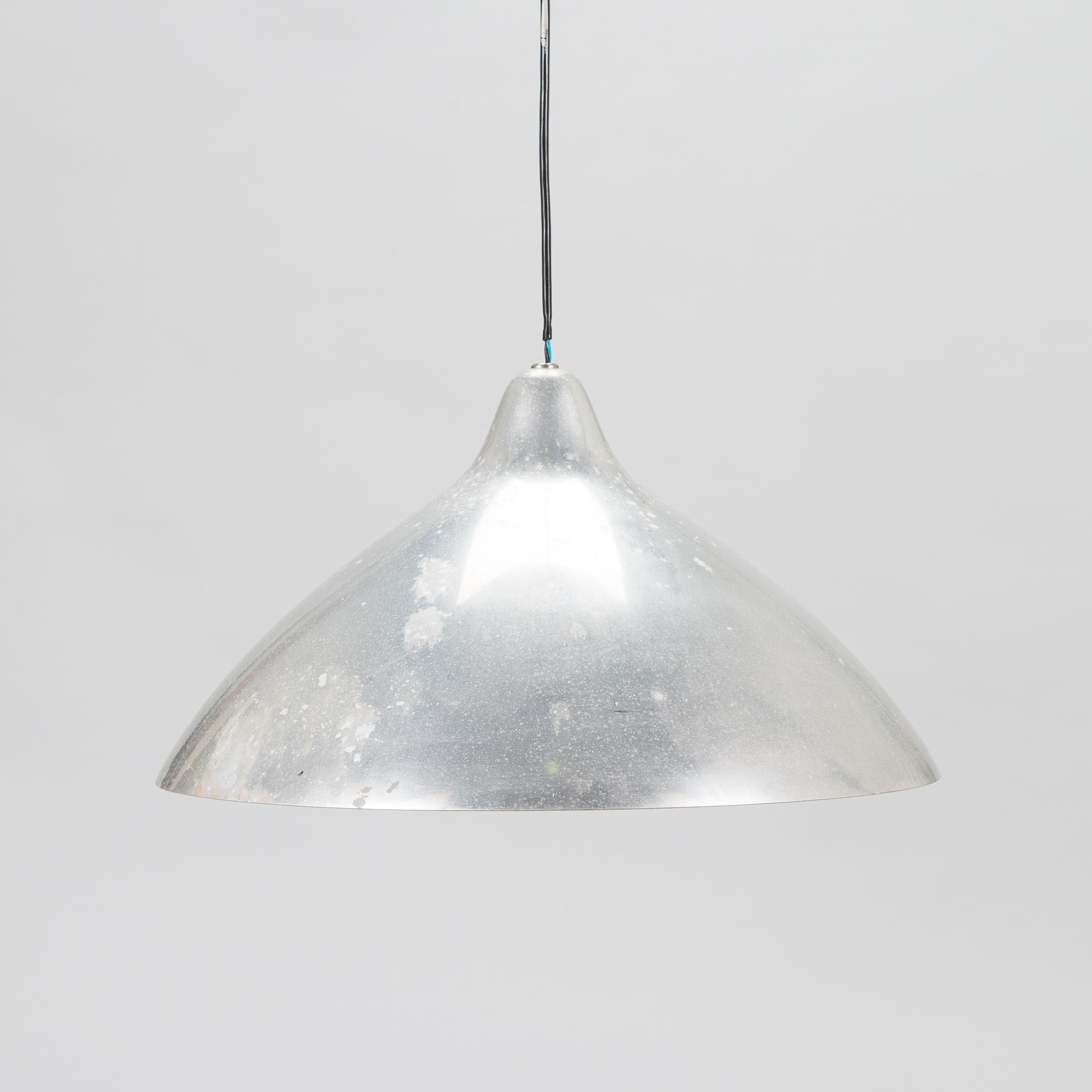 Lisa Johansson-Pape, a set of three pendant lights for Stockmann Orno, Finland.