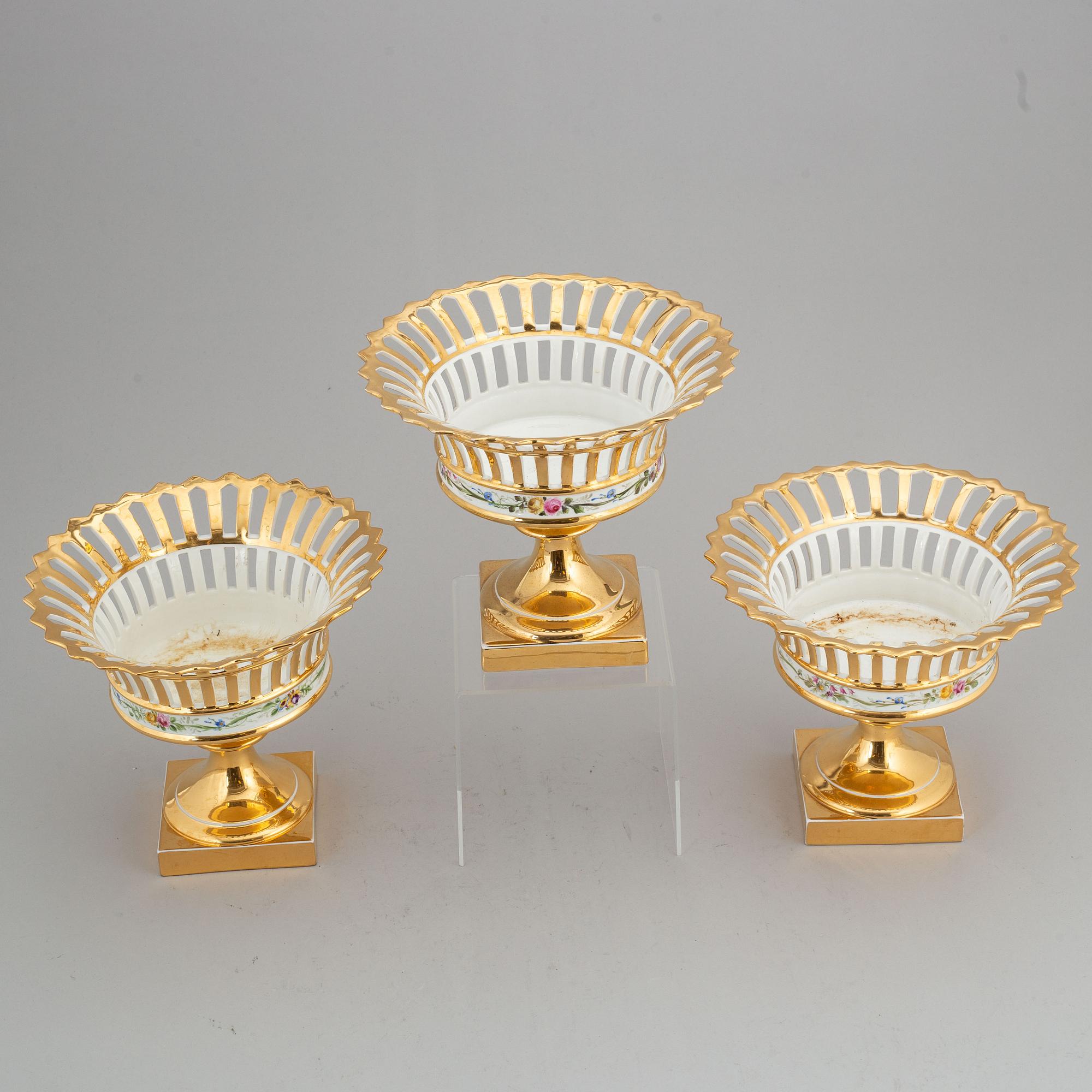 Three Rörstrand porcelain footed chestnut baskets, circa 1900.