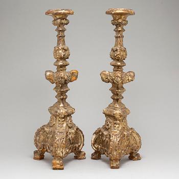 A pair of 18th century candlesticks.