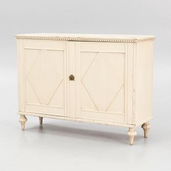 A late Gustavian cupboard, circa 1800.