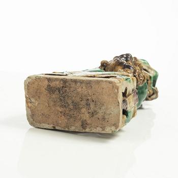 A Sancai glazed Buddhist lion incense/joss stick holder, Qing dynasty, Kangxi (1662-1722).