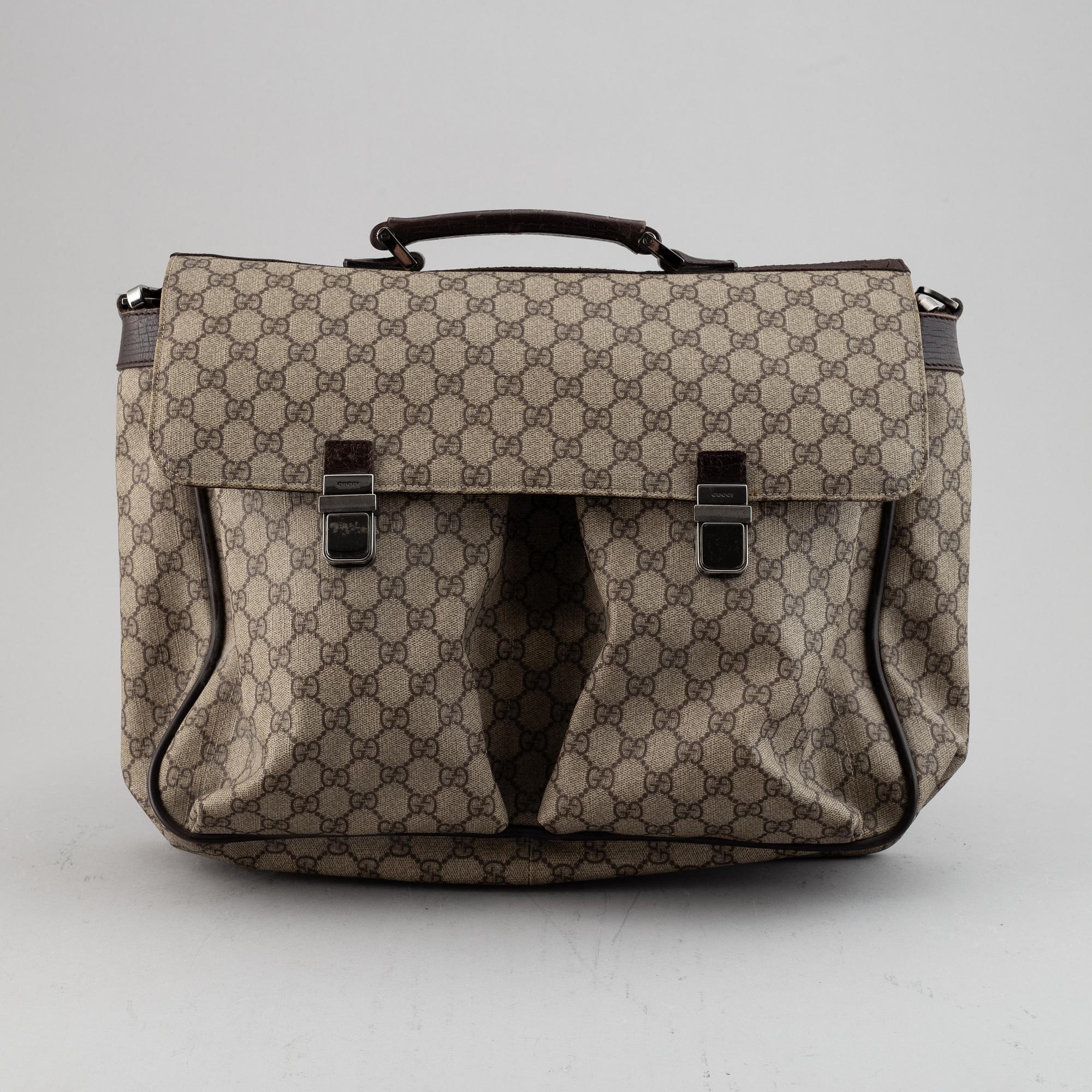 Gucci, a messenger bag.