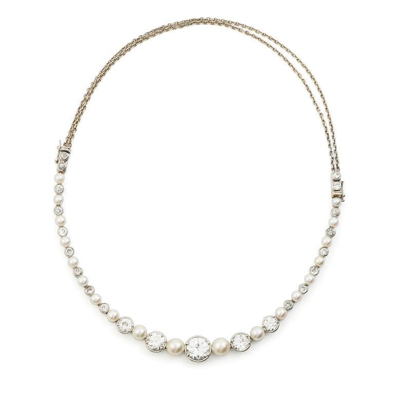 Bracelet/necklace platinum and 18K white gold with pearls and old-cut diamonds. Likely from the 1930s.