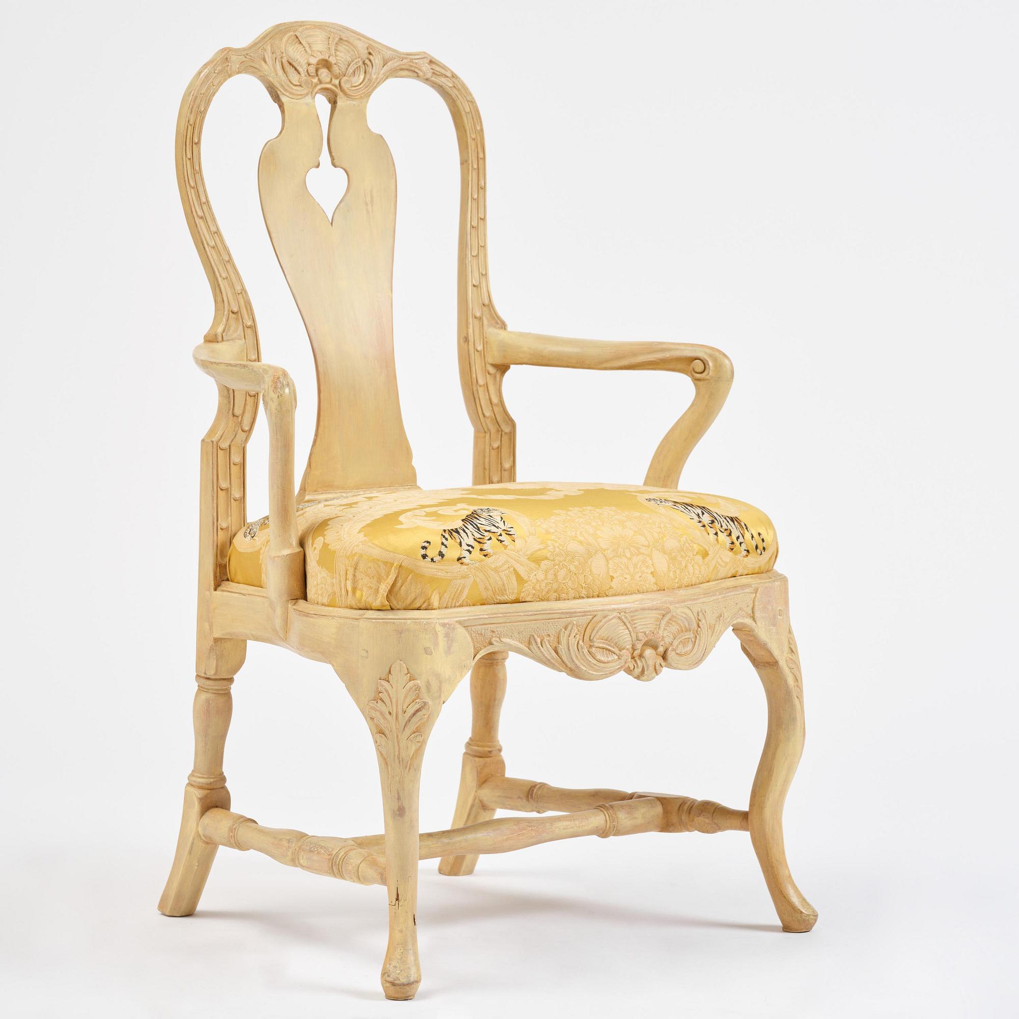 A rococo open armchair in the manner of C M Sandberg, Stockholm, later part 18th century.