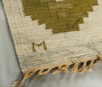 A flat weave carpet signed M from the second half of the 20th century.