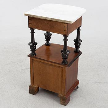 A bedside table, late 19th Century.