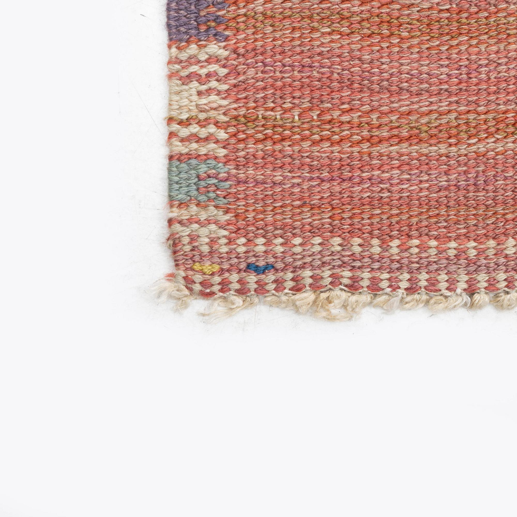 Barbro Nilsson, a carpet, 'Falurutan, röd Borås', flat weave, c. 502 x 212 cm, signed AB MMF BN.
