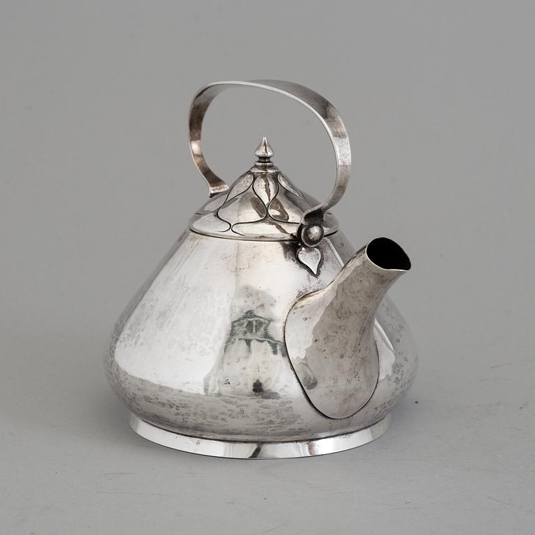 A Swedish Art Nouveau silver teapot, maker's mark CG Hallberg, Malmö, 1906.