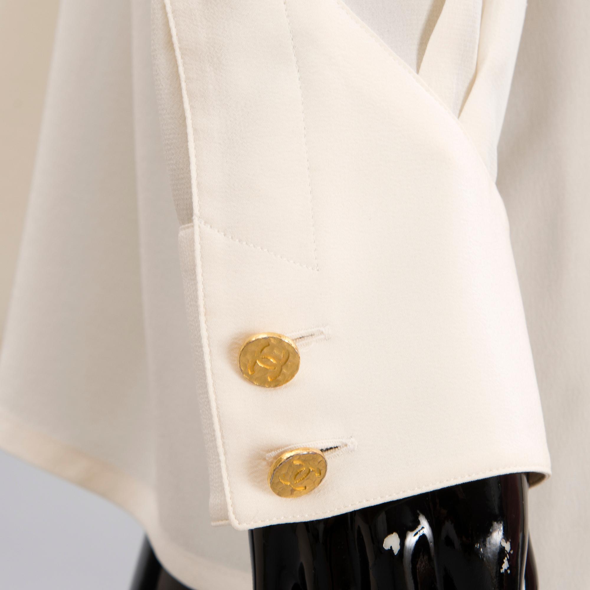 Two Chanel Crepe de Chine Cream Coloured Silk Blouses.