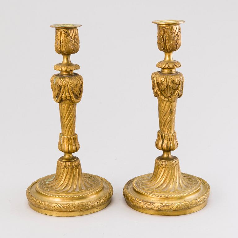 A pair of 19th century brass candlesticks, probably France.