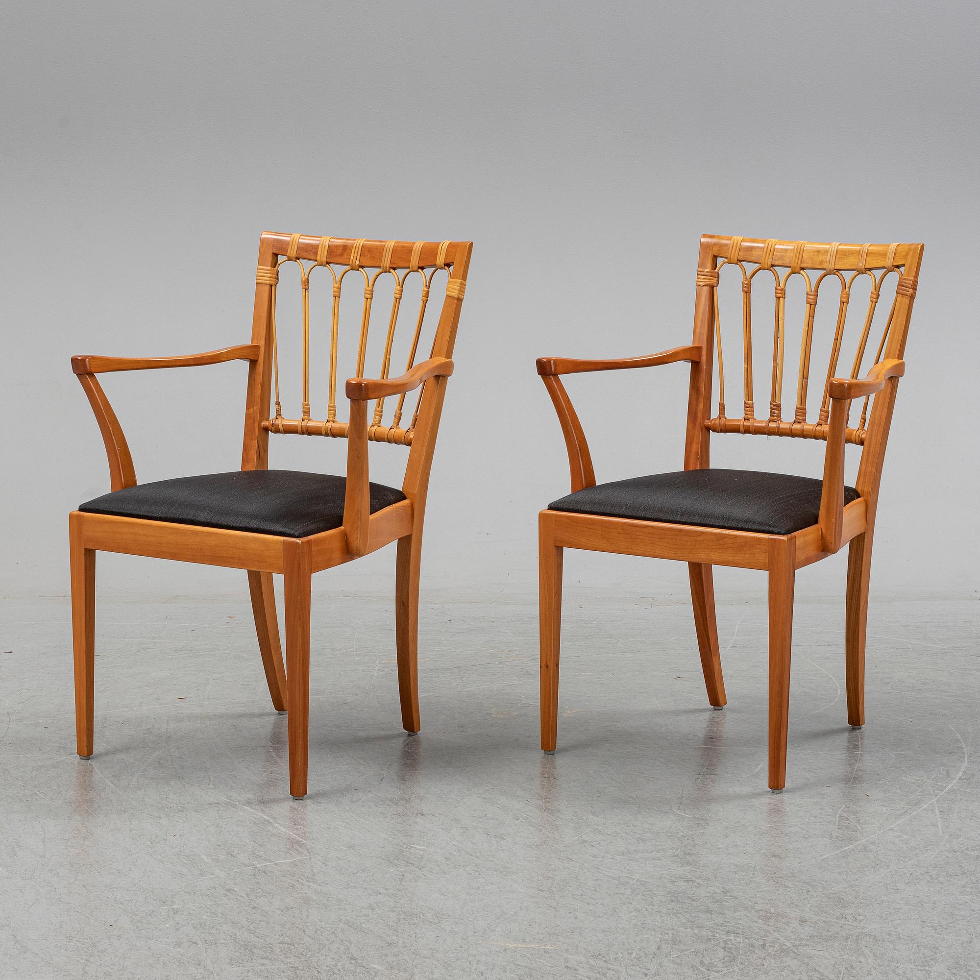 A pair of mahogany and rattan dining armchairs, Josef Frank, , model 1165, Svenskt Tenn, Stockholm.