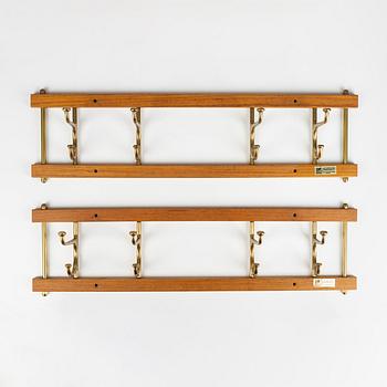 A pair of 'Dekorativ' teak coat hangers, Skoglunds metallgjuteri, Anderstorp, 1950's/60's.