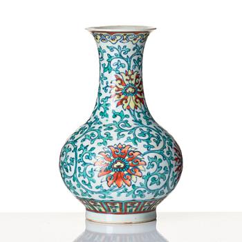 A doucai 'lotus' vase, Qing dynasty with Qianlong seal mark and of the period.