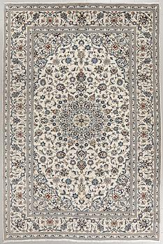 A Keshan rug, 295 x 200 cm.