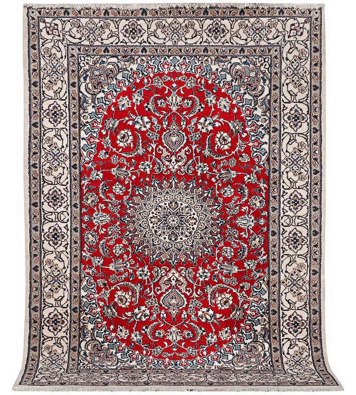 A Nain carpet, part silk, c. 303 x 198 cm.