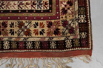 A carpet, antique Avanos, ca 190 x 136 cm (as well as 5 and 6 cm of flat weave on each end.).