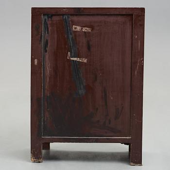 A carved and gilt wooden cabinet, Qing dynasty (1664-1912).