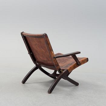 A leather folding chair, second half of the 20th century.