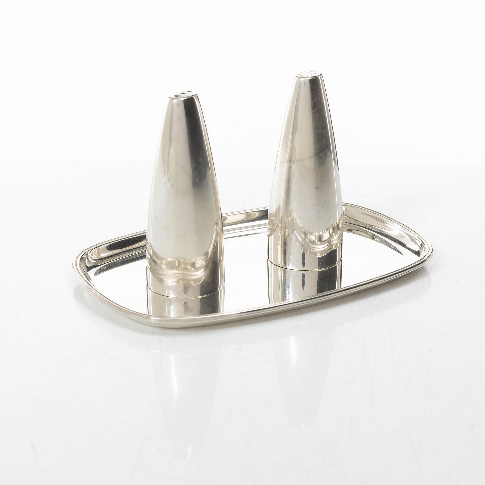 Salt and pepper shakers and tray, silver, including Henning Koppel for Georg Jensen, Denmark.