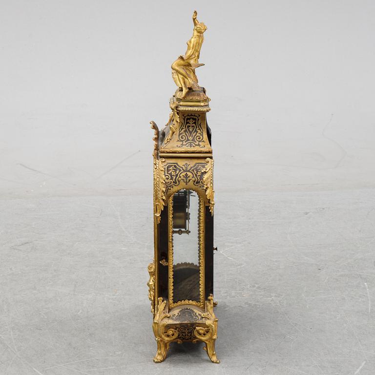 A French Boulle style mantel clock, 19th century.